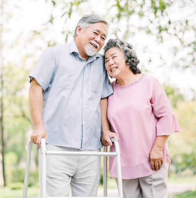 Elderly couple with walker